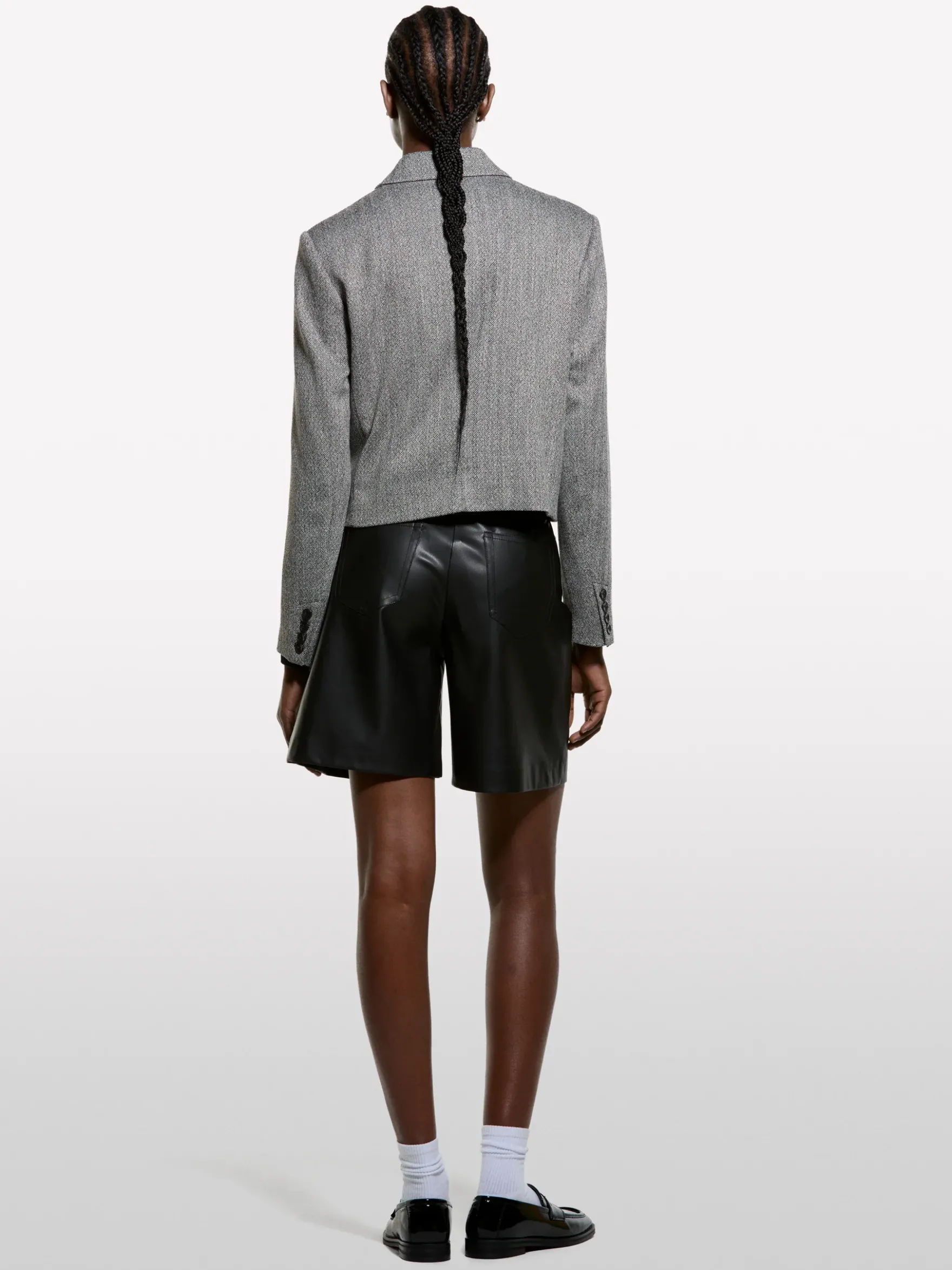 Blazer cropped con frange
