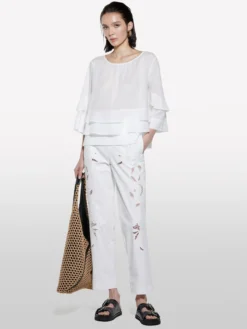 Blusa bianca con balze