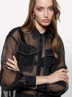 Camicia nera trasparente con tasconi