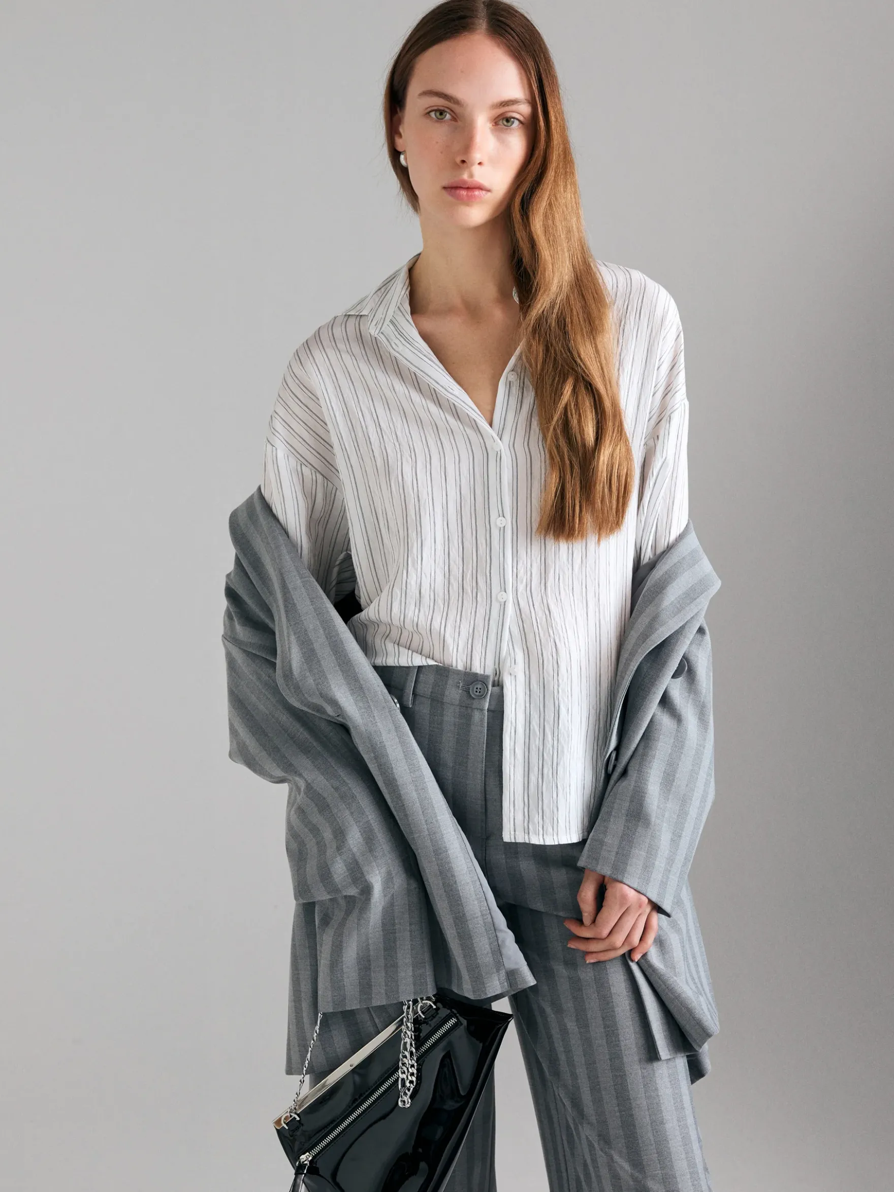 Camicia rigata con fibbia