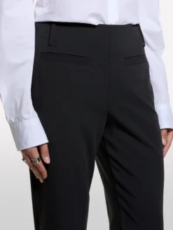 Pantaloni aderenti con gonna