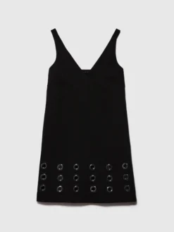 Vestito corto con occhielli